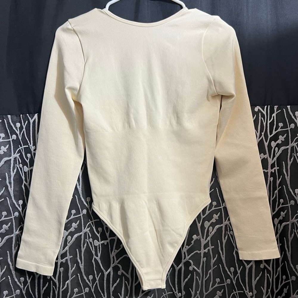 OGG Ribbed Bodysuit, size Large in Cream.